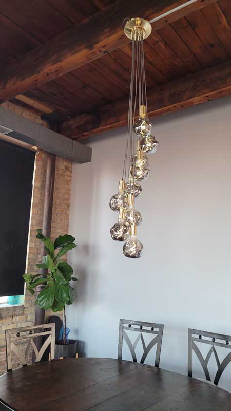 Mauve and Brass Staggered  light fixture